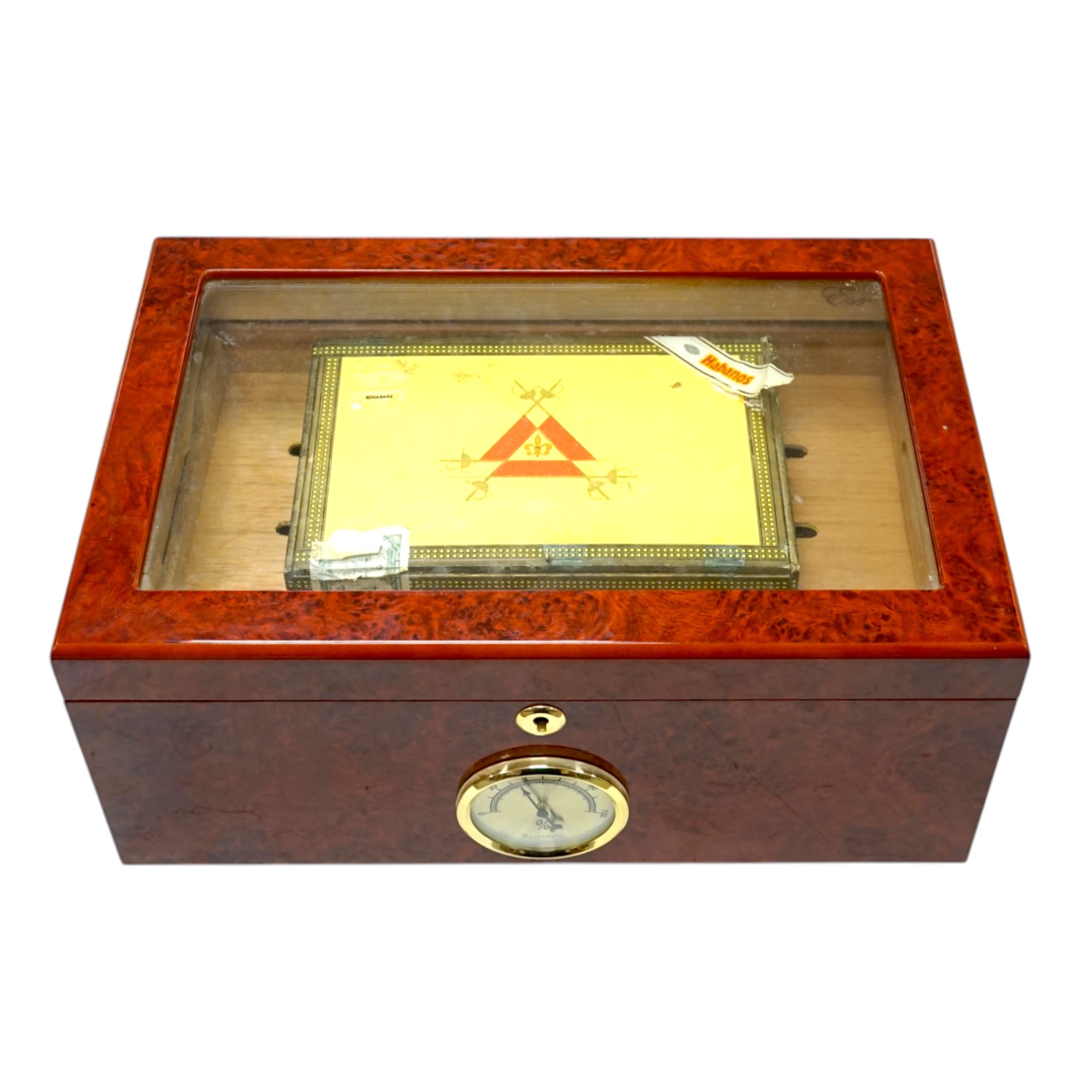 A modern EWT Thuya veneered humidor with keys, containing two boxes of Cohiba Esplendidos and Monte Cristo cigars (boxes opened). Condition - good